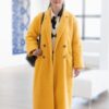 Only Murders in the Building S02 Mabel Mora Yellow Coat