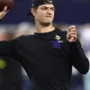 J.J.-McCarthy-Inspire-Change-Long-Sleeve-T-Shirt-Vikings-2025-Black-510x680