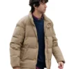 Alex Wolff Jumanji movie beige puffer jacket